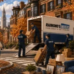 Raimond's Movers crew loading a moving truck on an autumn Beacon Hill street in Boston during a fall move